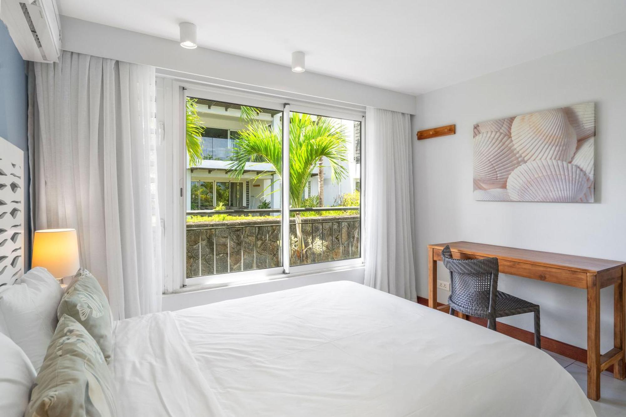 Kanope Bay - Holiday Beachfront Apartments Pointe aux Biches Экстерьер фото